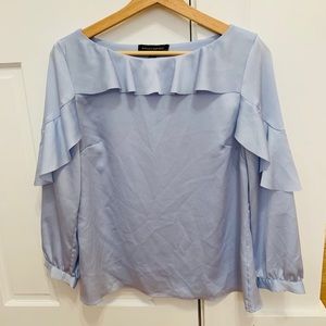 Pretty baby blue blouse without care instructions